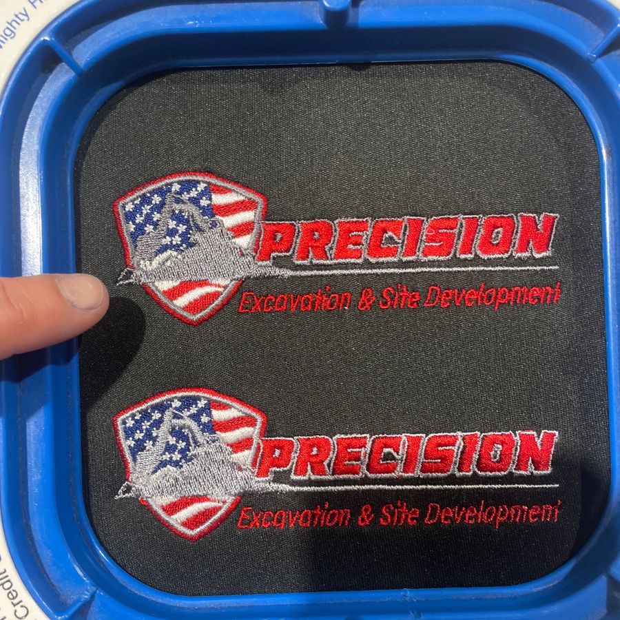 Precision Excavation & Site Development logos embroidered on black