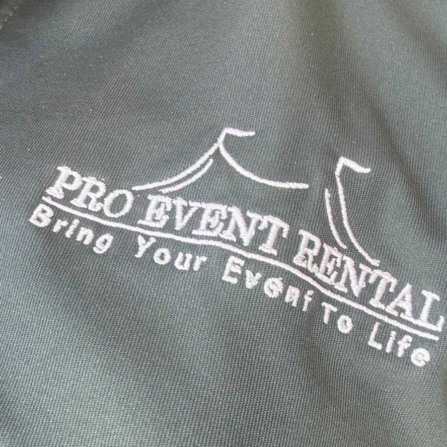 Pro Event Rental logo embroidered in white on a grey shirt