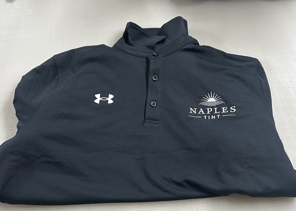 Navy polo with an embroidered chest logo