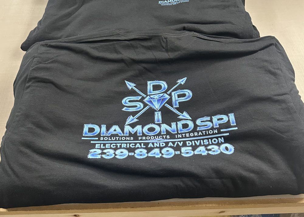 Black tees screen printed with a full front and back logo
