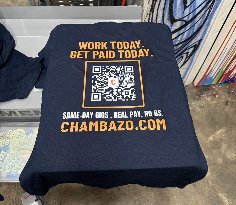 Navy tee back print with a QR code and website