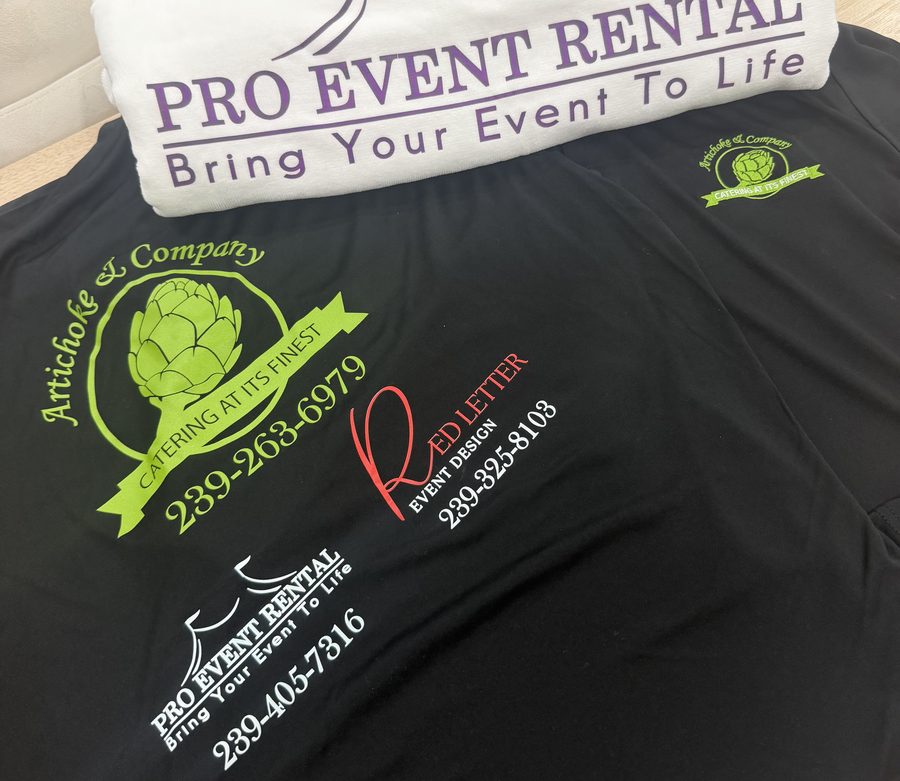 Event shirts printed with several colorful sponsor logos