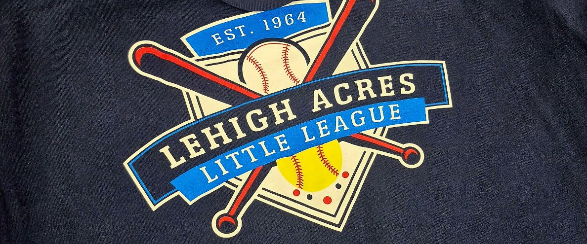 Navy tee with a multi-color Lehigh Acres Little League logo
