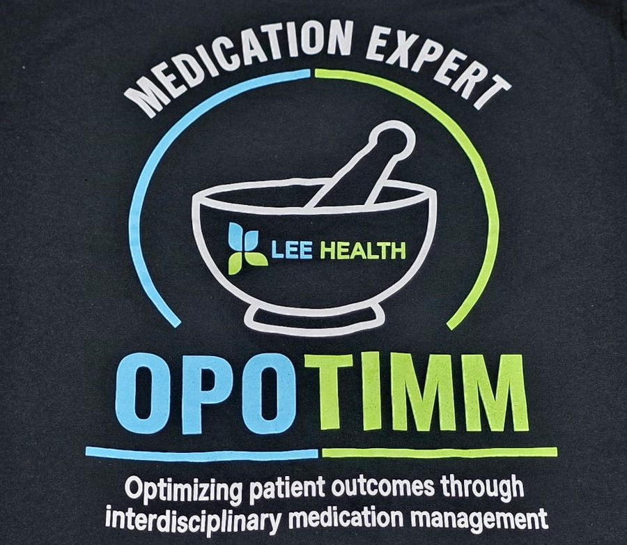 Black tee with a multi-color Lee Health pharmacy team back print
